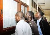 studnets cross checking their names at the Faculty of LAW, Makerere University